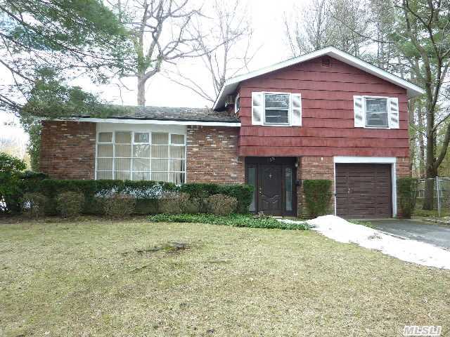 Large Split Level Brick & Shingle Home In A Prime Glen Cove Location. Entire Lower Half Of Home Recently Renovated. New Ceramic Tile Floors,  Carpeting,  Bathroom Partially Renovated. This 4 Br 2 Bth Home Features A Br/Office On The 1st Floor,  Eat In Kitchen,  Vaulted Ceiling In Living Room,  And Slate Floor Entry Foyer. Family Room And Basement On The Lower Level.