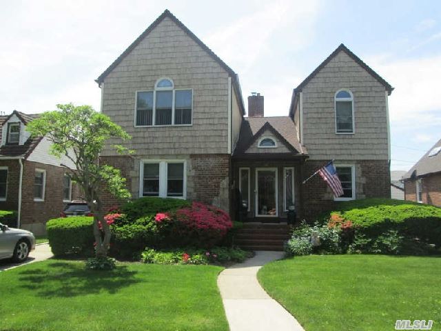 Gas Stove Gas Hot Water,  Thermo Windows That Tilt In On The 1st Floor,  2nd Floor Wooden Anderson Windows,  New Architectural Roof,  Garage,  All New Leaders And Gutters,  New Finished Basement With Ceramic Floor. New Appliances In Kitchen,  Cherry Cabinets,  With Granite Tops And Backsplash. Renovated Baths,  Beautiful Hard Wood Floors Throughout , Carpeted 2nd Floor.