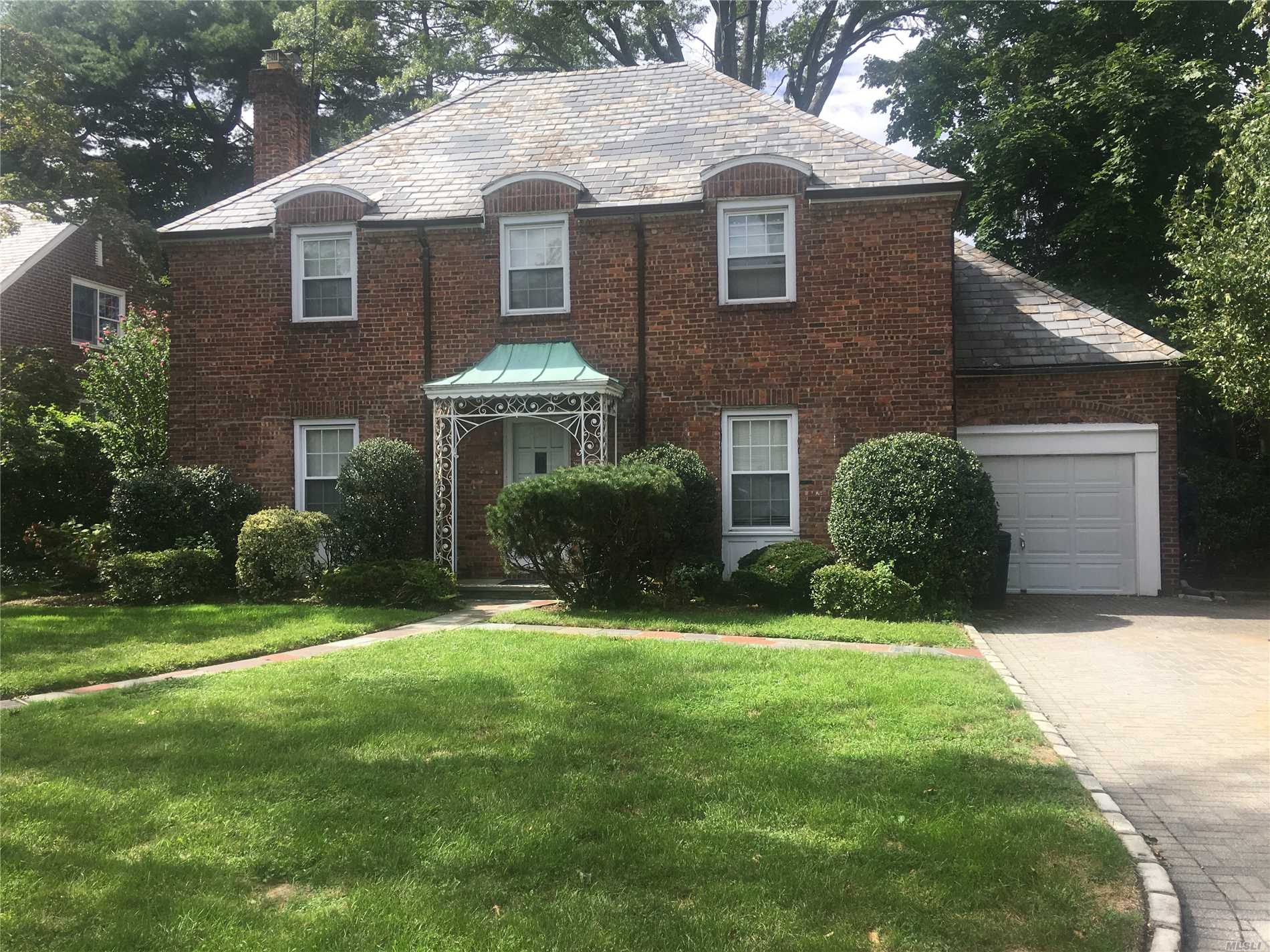 Classic Brick Center Hall Colonial With Slate Roof Set On Beautiful Flat Property In Desirable Shorehaven. This Home Needs Tlc And Features Living Room With Fireplace, Formal Dining Room, Eat-In Kitchen And Powder Room. The Second Floor Has Master Bedroom, Master Bath Plus 3 Bedrooms And Full Bath. Centrally Located And Convenient To Town, Schools And Train, Make This Home A Great Opportunity.