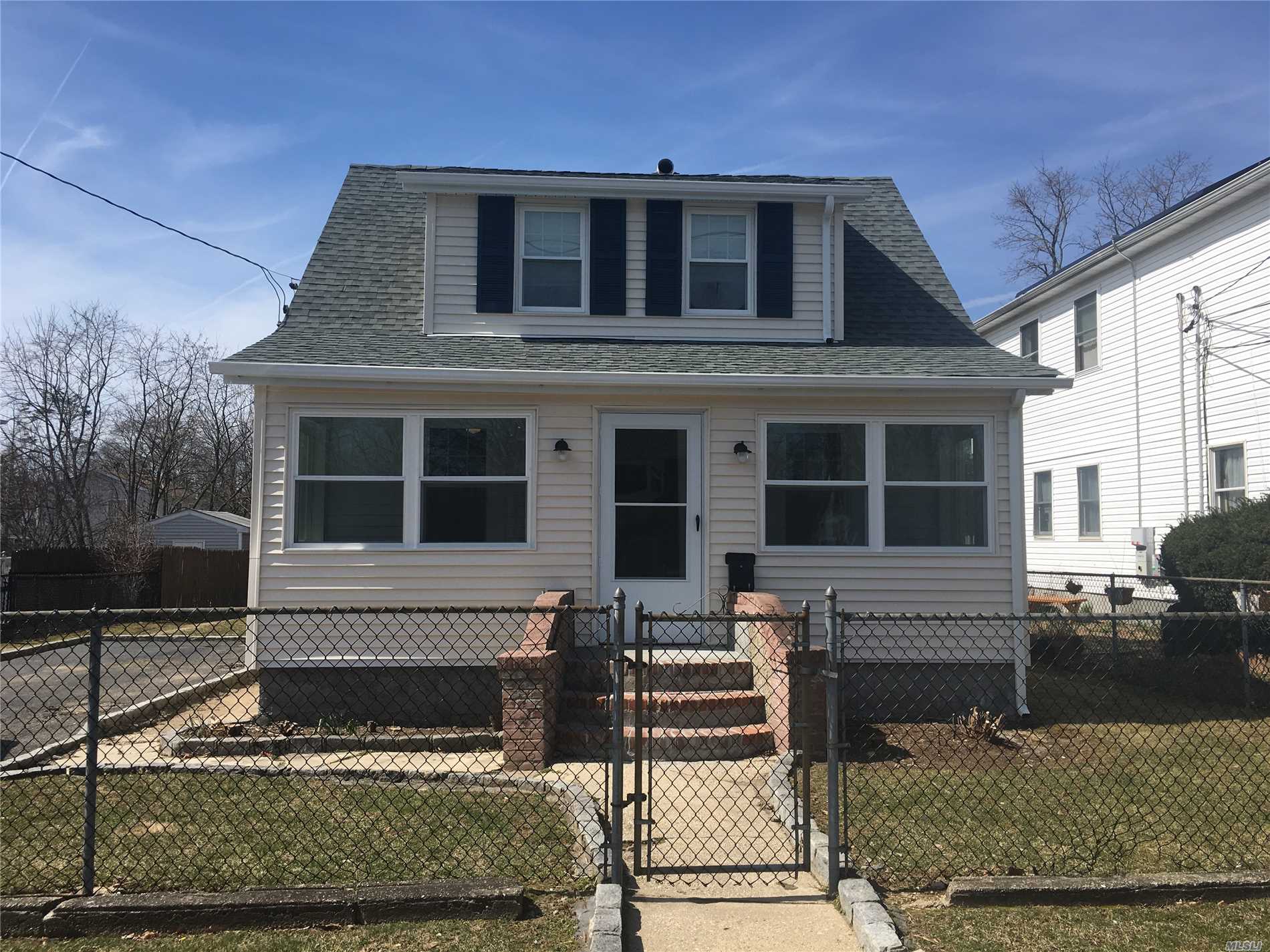 Charming Colonial totally redone. Inviting closed in front porch/New Windows/Roof/Gutters/New floors/doors/highhats/ceiling fans/bathroom/new R13 insulation throughout whole house/new electric panel/Spic and span Just move in and unapck.