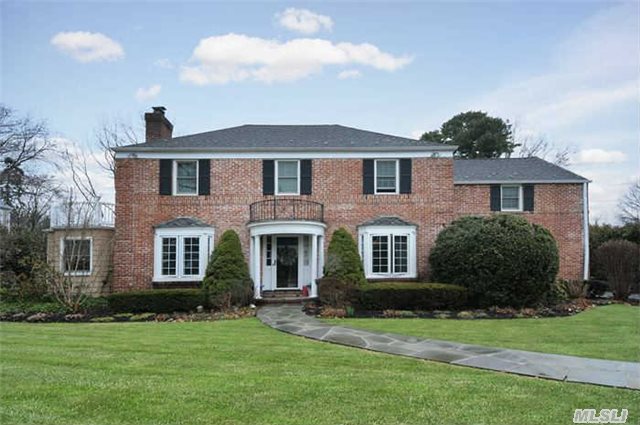 Sundrenched 1939 Brick Georgian Colonial On Flat 1/3 Acre In Flower Hill. Large Formal Living Room With Fpl. Family Room With Wood Burning Fpl. Formal Dining Room, Gourmet Eik With Oversized Granite Island Top Of The Line Appliances. Slate Mud Room With Separate Entrance & 2 Car Garage. Mbr With Master Bath. 3 Additional Bedrooms & 2 Baths., Back Staircase, & Gym.