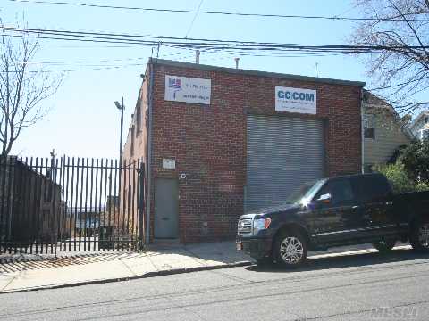 Brick & Block Warehouse. Has 1,800 Sq. Ft. Of Quality Office Space In Mezzanine. Building Had 20' Ceiling Height On First Floor Which Is Now 10' Except Space By The Roll-Up Door.