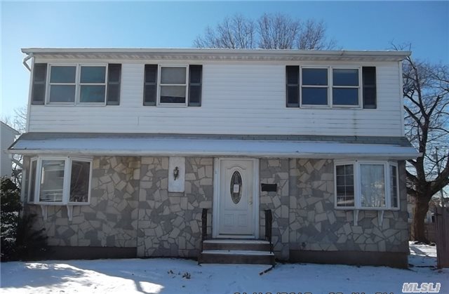 Front & Rear Dormer.  Two Car Detached Garage.  Conveniently Located To Major Highways,  Shops,  Rr.  Full Bsmt.  No Representation As To Any Appliance Being In Working Order.