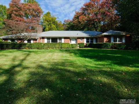 This Sprawling Brick Ranch Situated On Park-Like One Acre + Property With Exceptionally Large Den With Radiant Heat And Fireplace For Everyday Living And Easy Entertaining. New Gas System. Membership Available To The Sands Point Country Club For Golfing And Dining. Property Located Approximately 38 Minutes By Lirr To Manhattan.