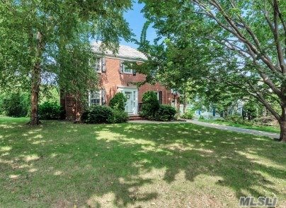 Center hall brick colonial in the Village of Plandome Heights. Living room with wood burning fireplace, formal dining room, eat in kitchen with granite counters and stainless steel appliances. Family room with access to deck and patio Three bedrooms, one bath