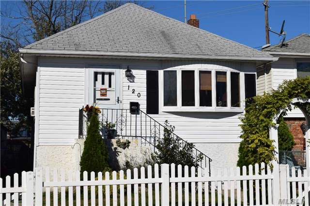 Spacious 2 Br, 1 Bath Raised Ranch With Living Room, Formal Dining Room And Eat In Kitchen Which Leads To Rear Deck & Yard. Full Basement, Driveway And Centrally Located- Close To Village Beach, Shops & Lirr.