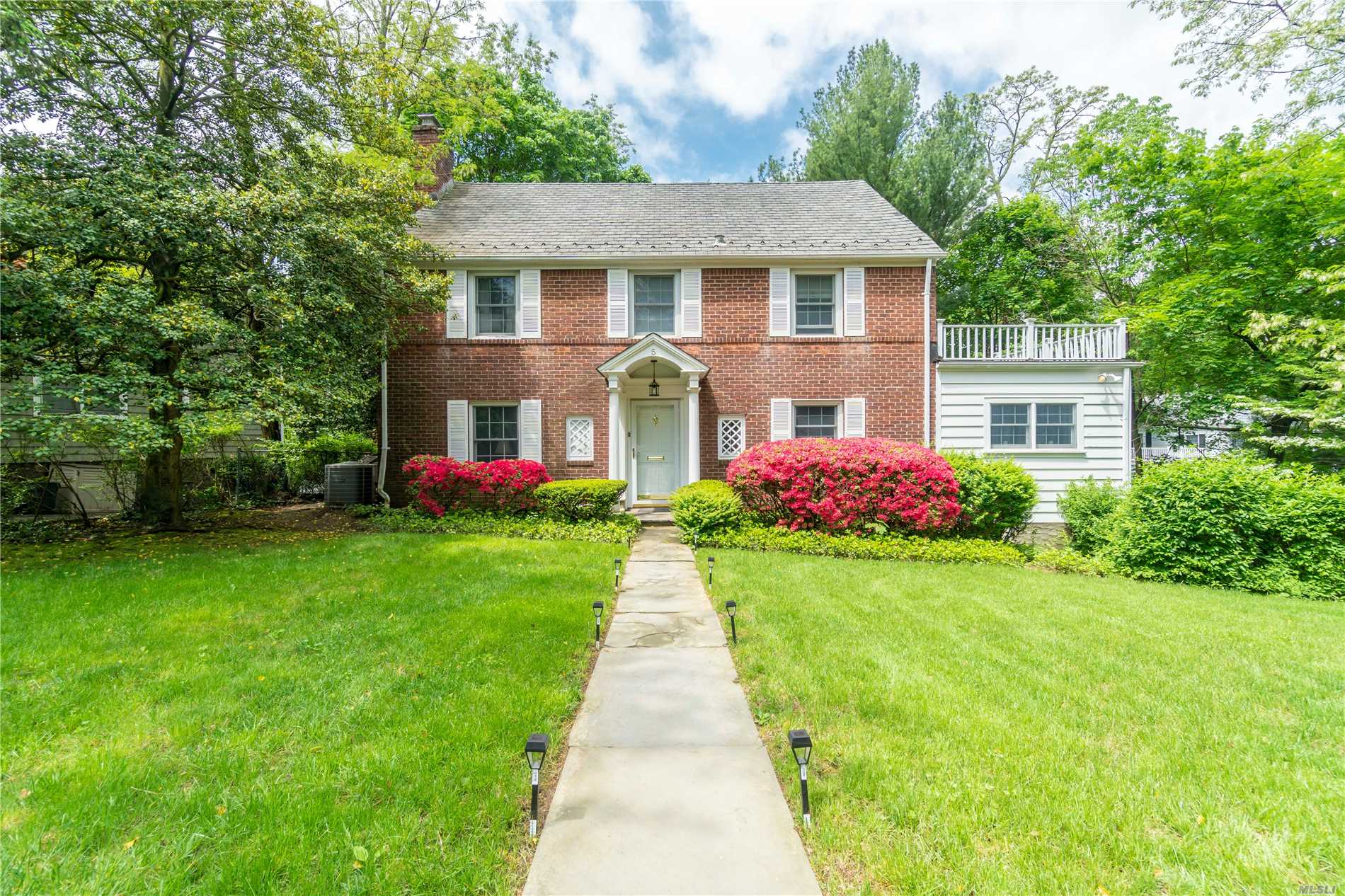 Charming Four Bedroom Beacon Hill Brick Colonial Featuring Spacious Modern Kitchen With Stainless Appliances, Two Renovated Bathrooms With High-End Fixtures, Generously Sized Living And Dining Rooms, Partially Refinished Basement, New Hot Water Heater, And Refinished Third Floor. A Quick Walk To Town And The Lirr As Well As Area Schools.