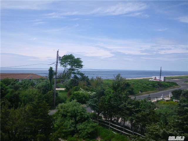 Spectacular Long Island Sound Views From Your Double Decked 2 Story Home. Ideal For Large Family With 5 Br's, 3 Baths Or Design Can Accomodate Mother-Daughter Lifestyle With Two Separate Entrances To Possible Two Apartments. Top Floor Features Great Room With Fpl, Large Watervu Family Rm, New Granite Counters, & Stainless Steel Appliances. Only 100 Yards To Sandy Beach.