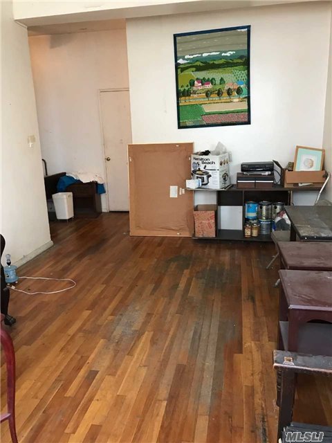 Super Large 2 Bedroom Apt With Eik, Huge Living Room And Sep Office Or Dining Space. High Ceilings Let In Tons Of Light. Hardwood Floors Thru Out. First Floor Unit. Needs Updating.