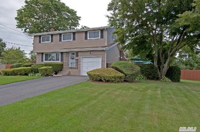 Immaculate One Owner Center Hall Colonial In Half Hollow Hills School District #5 Boasts 4 Bedrooms And Countless Updates! Windows= 5Yrs,  Stove & Microwave= 7Yrs,  Roof= 5Yrs,  Soffitts= 4Yrs,  Interior Paint= 4Yrs,  Exterior Paint= 5Yrs,  Driveway= 1.5 Yrs,  Indoor Oil Tank= 2 Yrs. Absolute Move In Condition!