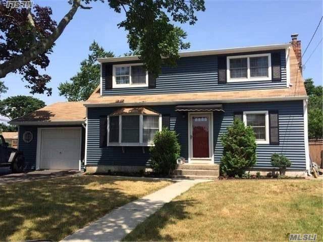 Diamond Home With Gorgeous Eat In Kitchen. Hardwood Floors Up & Down. Over Sized Bedrooms In This Dormered Cape. Lots Of Room - New Siding & Superb Insulation.