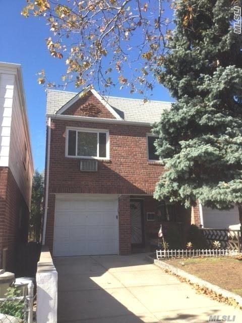 Great Investment! 5 Blocks To L.I.R.R Station (Broadway ) Solid Brick 2 Family, 2 Br's Over 1 Br Plus Garage. Quiet Dead End Street. Deck Off Second Floor.