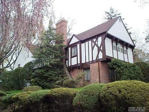 Magnificent Tudor Boasts An Oversized Sunken Living Room With Cathedral Ceilings,Stone Fireplace, Large Windows Throughout, Fabulous Wood Floors, Very Large Dining Room, Eat In Kitchen, Office, Bedroom With Full Bath And Powder Room On The First Floor. An Elegant Staircase Leads To A Master W/Full Bath, 3 Add'l Br's And Another Full Bath. 3/4 Of An Acre, Quiet Block 