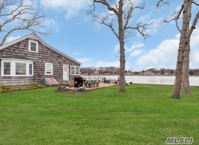 Summer Living Is Great At This Creek Front Cutie In Laughing Waters Community With Amazing Views Of Corey Creek. Features 4 Bedrooms, Eat In Kitchen, Living Room And Patio Overlooking The Water.