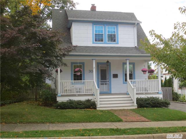 Charming Front-Porch Village Colonial On Quiet Dead-End St In Heart Of Town. Moments Walk To Shops And Train. Everything Updated-Kitchen,  Baths,  Roof,  Windows,  Heating & Cooling Syst. Lovely Features Thruout-Hardwood Flrs,  Ceiling Fans In Every Bdrm,  Family Rm In Bsmnt,  Large Attic,  Spacious Fenced-In Backyard,  2-Car Garage W/ Loft. Tax Reduction Already Granted For 2016!