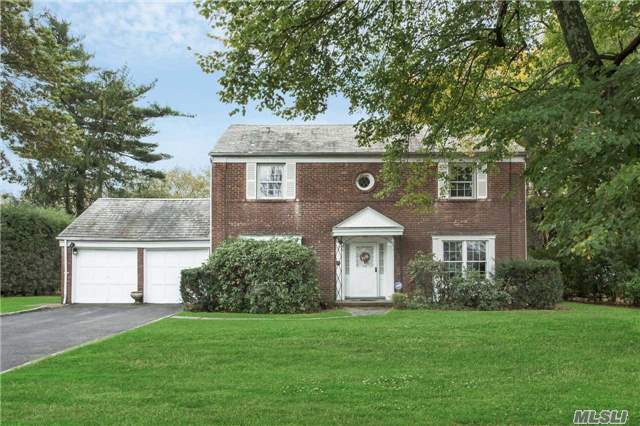 Classic Brick Center Hall Colonial Set On Beautiful Park-Like Property In Munsey Park. Living Room With Fire Place, Formal Dining Room With Corner Built-Ins, Kitchen, Breakfast Room, Bedroom And Full Bath. Second Floor Features Master Bedroom, Master Bath, Two Bedrooms And Full Bath. This Home Has Great Potential For Expansion And Presents An Opportunity To Customize.