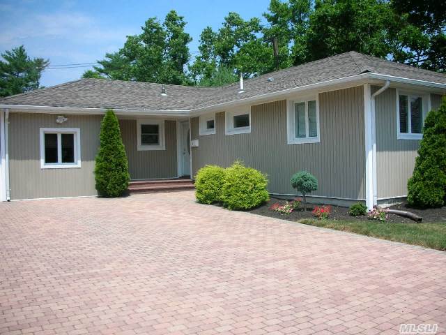 The Only Thing This House Needs Is A New Owner! This Pristine 3 Bedroom-2 Full Bath House Sits On 10, 200 Square Foot Lot-Remodeled In 2007 And Features New Roof-Windows-Siding-4 Car Paver Driveway And Patio-The Interior Boasts Hardwood Flooring-Maple Cabinets With Granite Tops And Ss Appliances-Garage Conversion With Co-Enormous Basement-Seeing Is Believing!