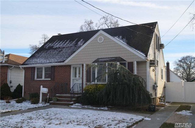 Super Low Taxes!!!! Not Effected By Sandy!!!This Charming Home Contains 4 Bedrooms, 2 Full Bathrooms, Wood Floors, Full Partially Finished Basement W/Ose, Newer Roof Siding And Windows, New Large Back Patio And Gas Heat!!! Close To Major Transportation And Shopping. Make This Your 2018 Dream A Reality.