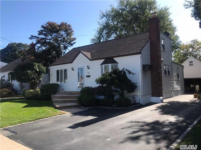 Four Bedroom Two Bathroom Expanded Cape. Large Extended Eat In Kitchen With Glass Sliders To Back Deck. Two Years Young Roof. New Boiler And Hot Water Heater. Newly Seal-Coated 5 Car Driveway. Additional De-Tatched 2 Car Garage W/ Stand Up Attic. Landscaped From Front To Back W/ Pavers Stoop. Full Basement. Must See Property!