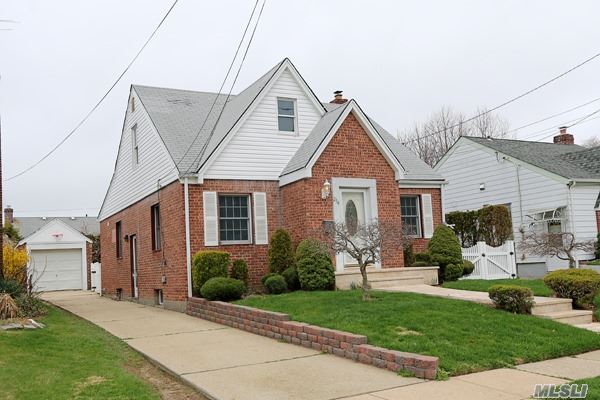 Mint Brick Cape. Polk Street Elementary. New Eat In Kitchen With Granite Floor And Countertops. Marble Bath On Main Floor. Finished Basement With Ceramic Floors. Beautiful Wood Floors Through Out. Too Much To List. A Must See!