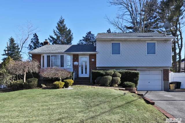 Opportunity Knocks!Welcome Home To This Brick/Vinyl Split Set On A Lovely Residential Block! Curb Appeal Includes Replaced Windows,  Newer Roof,  Extended  Driveway,  Great Yard With 2 Tier Deck,  & Storage Shed. Interior Features Comfortable Lr & Dr,  Updated  Eik,  3 Bright & Airy Brs,  2 New Full Bths,  Den,  Plus Finished Bsmt With Playroom & Laundry.Baylis Elem & Thompson Mid