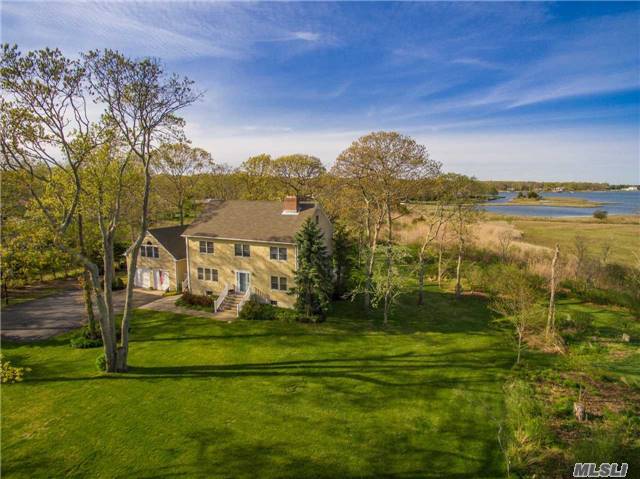 Enjoy Exceptional Pride Of Ownership And Panoramic Waterviews Across Your Own Four Acres Of Scenic Shorefront Property In This Well-Built Traditional Home Featuring Large Rooms And Top-Quality Construction. Membership Rights In Goose Neck Estates Association Provide Convenient Nearby Beach Access And Dock Space.