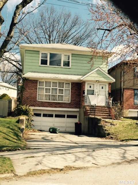 Spacious Detached Brick/Frame Colonial, Great Block In Whitestone, Near Shopping And Buses. Great Investment For A Large 2 Family In Whitestone!