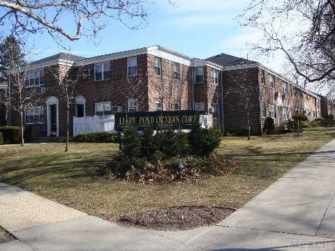 Affordable Corner One Bedroom Unit Located In Manicured Court Yard. 3 Exposures With Lots Of Sunlight, Hardwood Floors Under Carpet, Spacious Rooms, Lots Of Closets + Walk-In & Lots Of Windows Throughout. Must See!