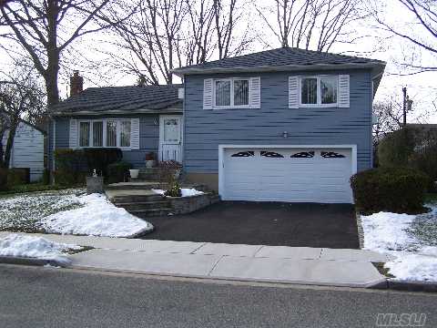 Fabulous Well Maintained Split Mid-Block Location On Quiet Street W/Kramer Lane Schools,Ready To Move In. Neat & Clean! Updated Kitchen,New Windows,7 Year Young Roof,New Garage Door,New Driveway/Sidewalk,Alarmed. Highhat Lights. Taxes Do Not Reflect Star Savings Of $924.67 Owner Wants To Hear Offers.