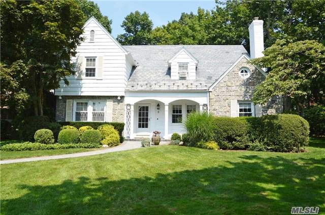 Gracious, Inviting Shingle/Stone Colonial In A Beautiful Country Setting. Slate Roof, Stained Glass Front Entry, Hardwood Flrs, Fdr, Lr W/Gas Fp, Comfy Fr, Eik W/Granite Counter Tops, 2 Staircases & Renovated Powder Rm. Near Worship, Main Library, Town, Lirr & Saddle Rock Elem Schools. Lrg Pvt Landscaped Backyard W/Deck. Parkwood Community Pool & Tennis Court.