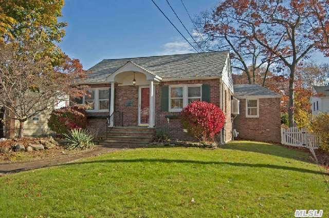 Charming Brick Ranch Offers Beautiful Hardwood Floors, Den W/Vaulted Ceiling, Skylights & Anderson Doors To Deck, Original Hardwood Doors, Full Basement, New Roof & Windows Plus 1 Car Detached Garage