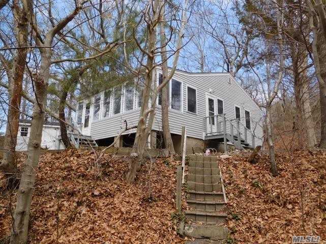 Year Round Or Vacation Home. Close To Long Island Sound. 10 Ft. Non-Contiguous Owned Waterfront. New Windows And New Roof. Enclosed Porch. Close To Boat Ramp.