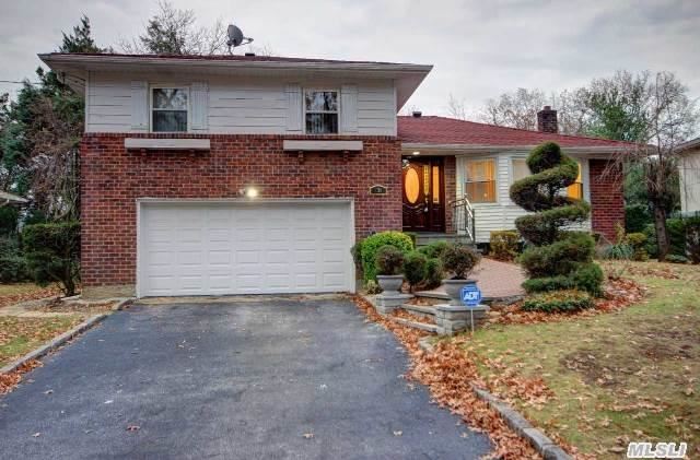 Lovely Home In Charming Roslyn Heights! This Updated Brick Home Features 3/4 Large Bedrooms, 3 Updated Baths, Large Eat-In-Kitchen With Granite, Bright Dining Room, Large Living Room And Huge Den With Sliders To Large Deck Overlooking This Private & Well Maintained Backyard! Needs Nothing, Won't Last!