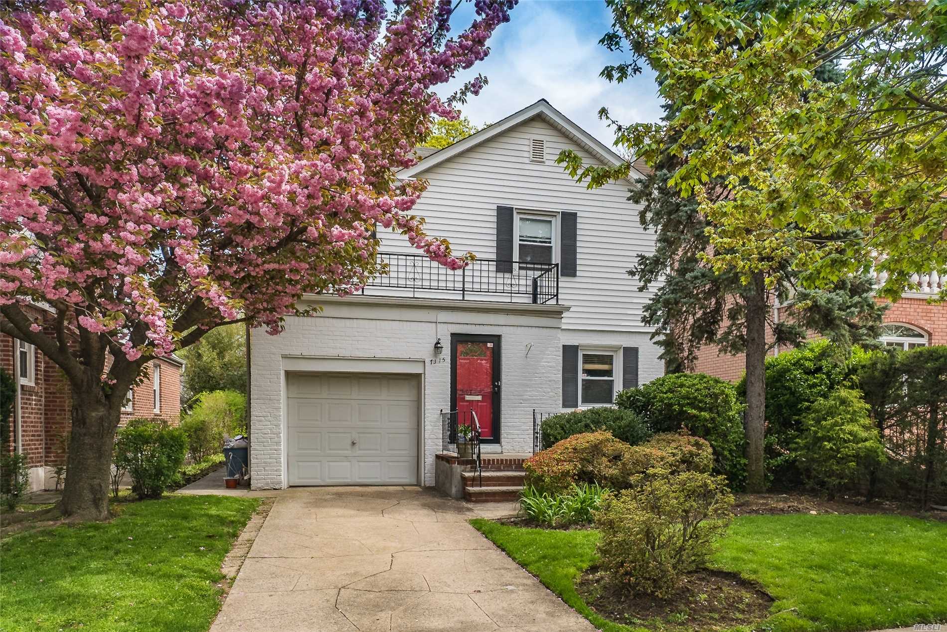 Exceptionally well-kept brick and siding colonial features 3 bedrooms, 2 baths, an updated kitchen with walk-in pantry, a spacious finished basement with family room, as well as a huge beautiful family room on the first floor that leads to the tranquil backyard.