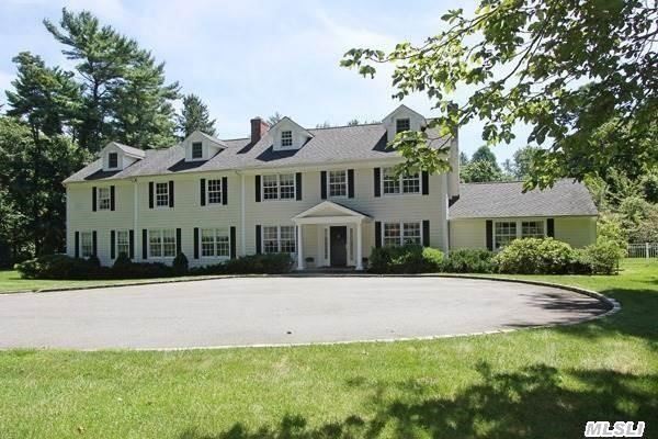 Classic Elegance In This Custom 11 Year Young Diamond Colonial Regally Set Back On 2.73 Parklike Quiet Acres With Gunite Heated Pool.  Possible For Multigenerational Living,  Three Stall Barn,  Private Entrance To Preserve. Jericho School District. Must See To Appreciate.  Property Taxes Do Not Reflect Star Exemption Of $748.08