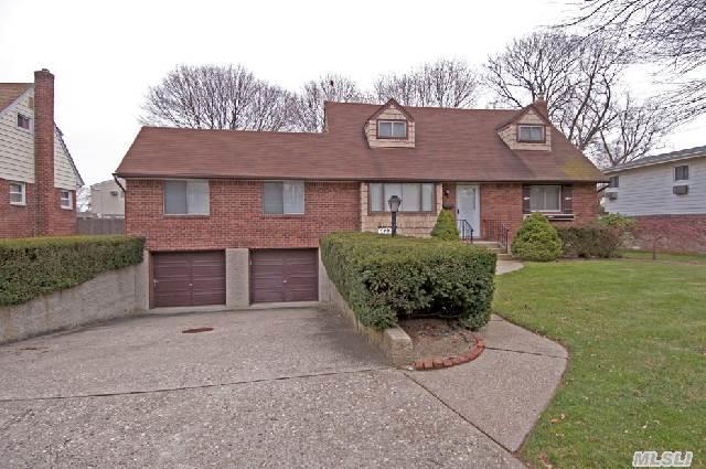 Expanded Westside Cape W/Full Residence For Mom & Dad. Custom Breakfast Rm. Off Kitchen,  Large Den,  Huge 2 Car Garage,  All Large Bedrooms,  Cac And 4 Zone Gas Hot Water Heat!