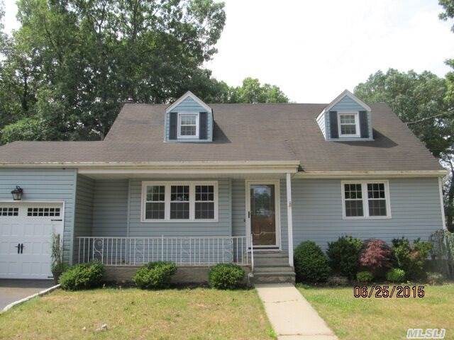 Pretty Cape In Great Area.7 Rooms 4 Br 2 Bath With Full Basement.