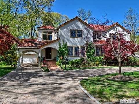 Glorious Mediterranean,  Tot Renov W/Circ Driveway+O'sized Lot,  Beautifully Landscaped. Gallery Foyer W/Marble Flrs,  Grand Lr W/Fpl,  Fdr,  Library,  Lg Fam Rm W/Porch. Oak Flrs Thruout, Great 4 Entertaining. Beaut Eik W/Top-Of-The-Line Appl & Granite Counters.Mrble Pwdr Rm+Lg Lndry/Pntry.Sep Guest Br W/Bth, 3Lg Br's, 2 Bths & Grand Mstr Ste+Bth+Balcony. Generator,  Heated Garage.