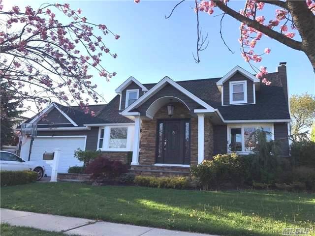 This Gorgeous Rear Dormered Cape Is .All New In/Out! Features Cust Chef&rsquo;s Kit/Gran/Os Cent Isl..Ext Ent.Foy..New Bths..Fam Rm W/Cust Tv/Bar..Hw Flrs..Paver Drive/Yard..Exquisite Enteryard/Igp/Htd/Salt Water..Cac..Radiant Heat/1st Fl...Stunning..No Expense Spared..Must See!!
