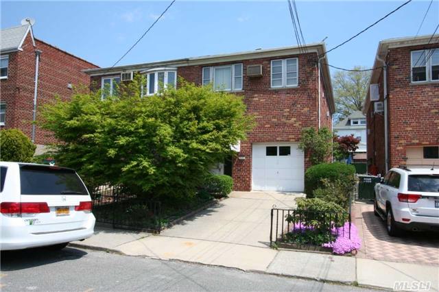 Semi-Detached Brick Two Family Home. Features 3 Bedroom Apartment Over 1 Bedroom Apartment And A Full Basement. There Is Also A One Car Garage And Private Driveway.