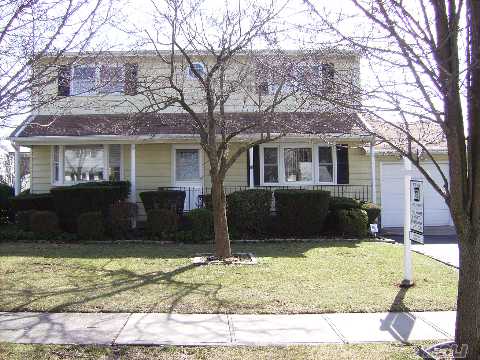 Outstanding Colonial In A Fantastic Location! Banquet Sized Dining Room! Open Floor Plan! An Eat In Redone Kitchen With Adjoining Family Room Complete With Romantic Fireplace Or An In Ground Heated Pool! This Home Boasts It All Plus A 4 Zone Sprinkler System, Central Air, All New Thermo Windows, New Roof, And Alarm System. Make This Your Next Address! 