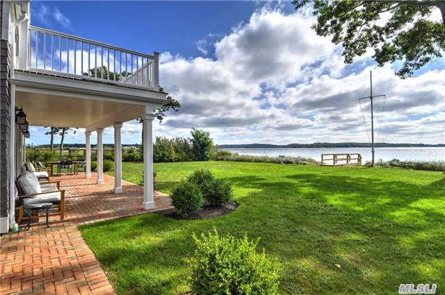 Spectacular Bay Front - Southold. Sunlight Illuminates Throughout This Newly Renovated Home With 110 Feet On Peconic Bay & Endless Views Of Shelter Island. 4 En-Suite Br, + 1.5 Ba, Gr W/ Fpl, Formal Lr & Dr, Gar & Generator. Ease & Elegance Make This Home Perfectly Suited For Entertaining. Close To Award Winning North Fork Vineyards, Farm Stands & Restaurants.