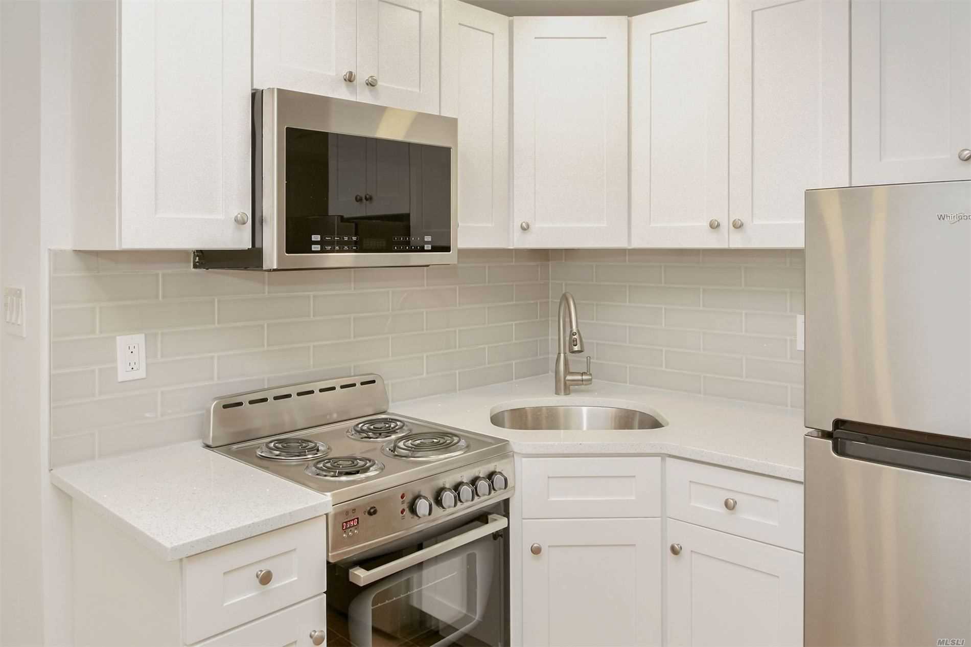 Lovely, sunny studio, beautifully renovated w/new appliances. A rare find in Forest Hills Gardens!