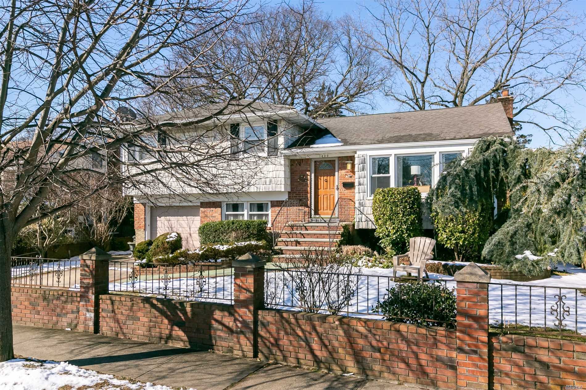 Beautiful brick split on a quiet tree lined street near schools and shopping. Gleaming Hardwood floors throughout the Living Room & Dining Room, bright and Airy EIK with sliders onto the deck perfect for entertaining w/Gas cooking, BBQ hookup and Fireplace, All Appliances less than 3 years old. 3 Bedrooms, full bath has dual sinks, New floors in office/family room and built-ins and updated bath, OSE, CAC Roof less than 10yrs (1 layer)