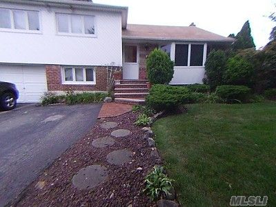 Great Split, 3Br, 2.5 Bth,  Ceramic Flrs In Eik And Fdr, Den , Washer/Dryer Rm, Full Part Fin Bsmt/Office, Storage Area. Mbr/Full Bath & Walk In Closet. Beautiful Yard, Heated Inground Vinyl Pool, Large Deck Off The Dr With Sliders. New Boiler, Cac, Crown Molding. Bay Window And Much More.