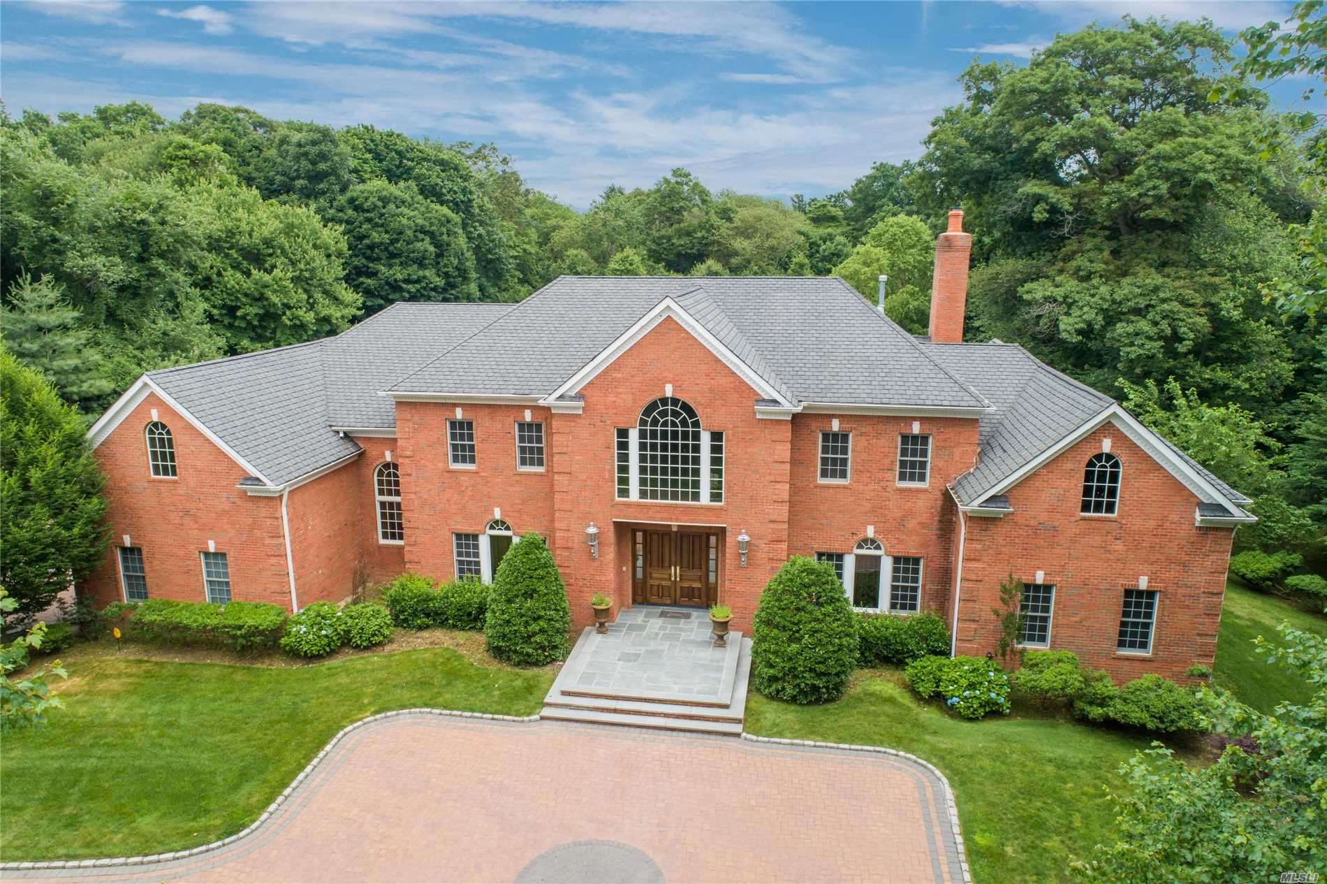 Builders Own! Gated Private Road Leads To This Elegant Brick Centre Hall Colonial On 5.4 Manicured Acres. Over 6600 Sq.Ft Of Luxurious Living In The Incorporated Village Of Old Westbury. Double Entry Foyer, State Of The Art Gourmet Eik Overlooking Formal English Gardens. Expansive Living Room, Dining Room, Den W/Fpl, Office, Bonus Room, Master Suite W/Fpl, 5 Bedrooms And 4 Baths. Movie Theatre. 3 Car Garage And Tennis Court. Room For A Pool. Jericho Schools!