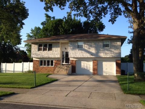 Mint Wideline Hi-Ranch On Oversized Lot. New Roof, Gas Heat And Cac. Fully Fenced In Yard, In Ground Lawn Sprinklers. Ground Floor Offers Huge Living Room With Exit To Yard And Plumbing For 'Summer Kitchen,' New Full Bath, Laundry Area, And Garage Access. 2nd Floor Eik, Formal Dining Room With Exit To Deck And 3 Bedrooms And 1 Full Bath. Star Savings, $1,549.55