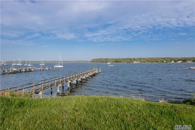 Beautiful 3.3 Acre Waterfront Colonial With Dock. House Has Tons Of Room And Potential To Make Your Very Own. Five Large Bedrooms And 4.5 Baths. Gently Rolling Property With A Pool Over Looking The Sound With Pretty Views Of Cove Neck. Enjoy A Large Brick Patio Overlooking The Water With A Pond With A Waterfall.