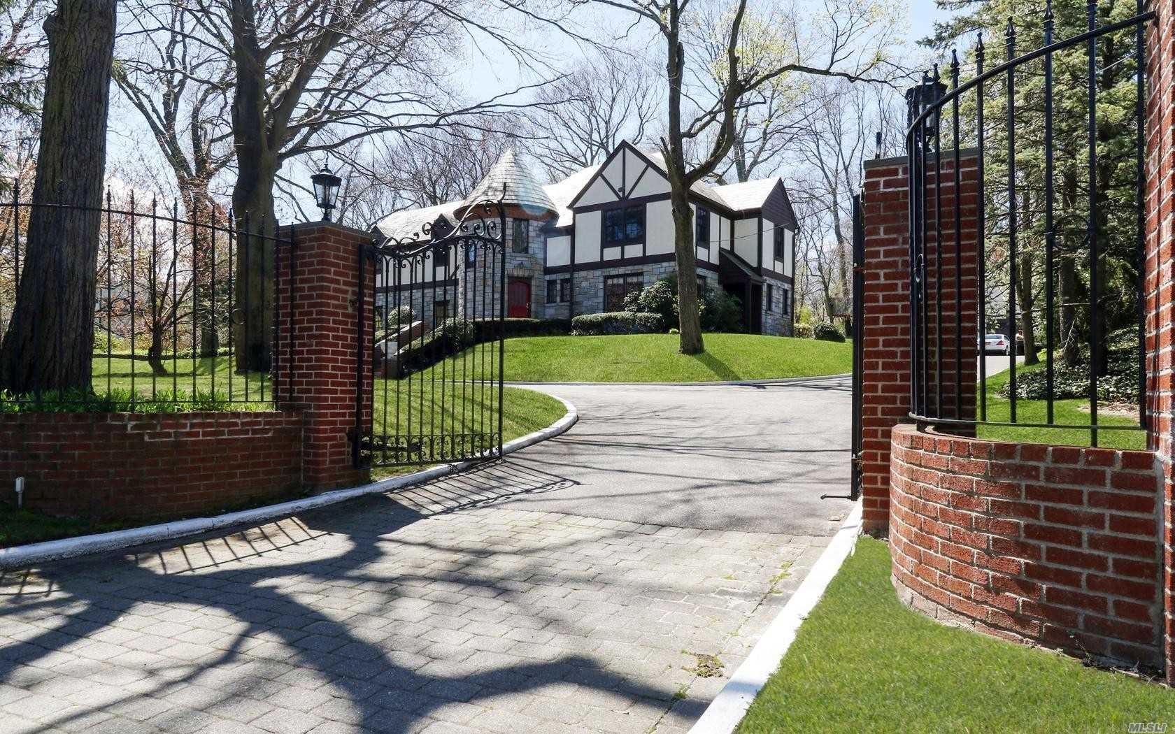 This listing includes a 0.6Ac buildable lot. See separate listings for Land MLS#3153437 & House MLS#3153432. Spectacular Masonry Tudor On 1.79 Acres Of Park-Like Property! Features include Double Gates, Granite & Stained Glass Turret, Vermont Slate Roof, 7BR, 5.5Bth, Including A Separate Guest Cottage, 3 Fireplaces, Full Finished LL W OSE, Blue Stone Patio, Built-In BBQ, & 65&rsquo; In Ground Heated Pool. Roslyn School District. Taxes Grievance in Progress.