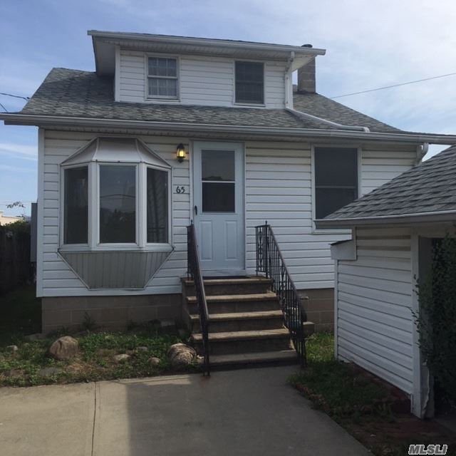 House is in nice condition, upstairs needs work, Bulkhead is in need of repair, AE flood zone, Garage needs repair, great water location. House much larger than it appears.